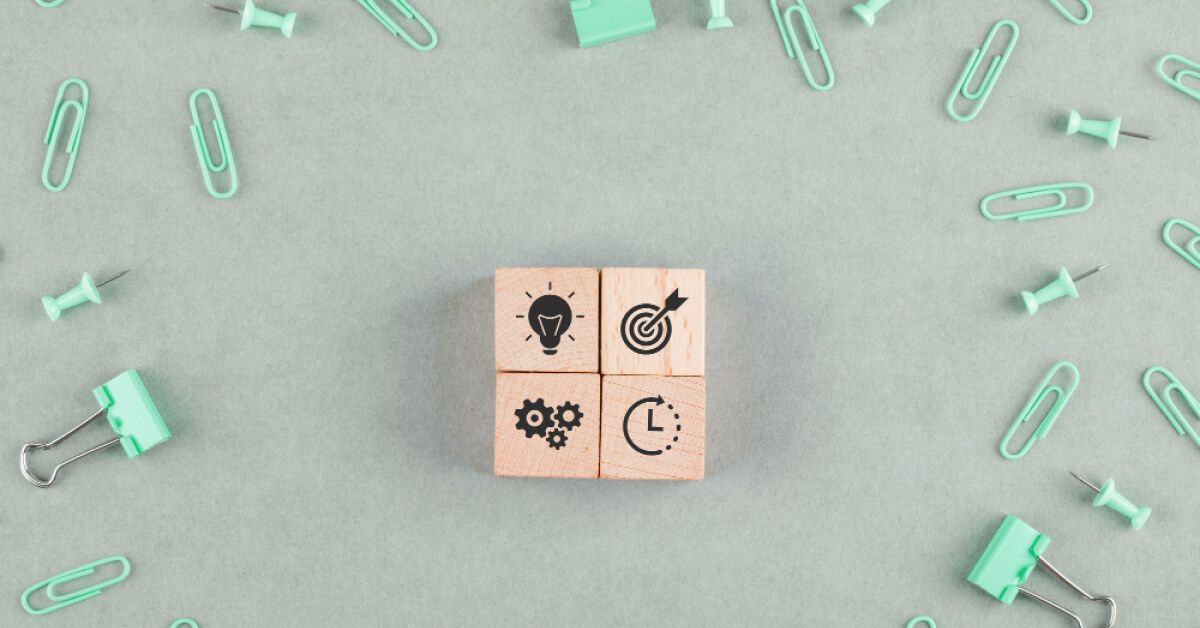 4 wooden blocks with different types of graphics