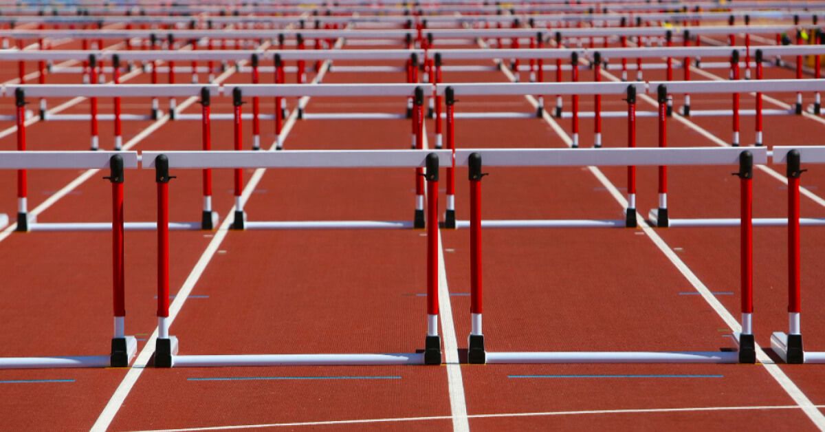 An arrangement of athletic hurdles on a track