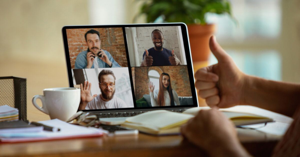 Employees participating in a virtual meeting