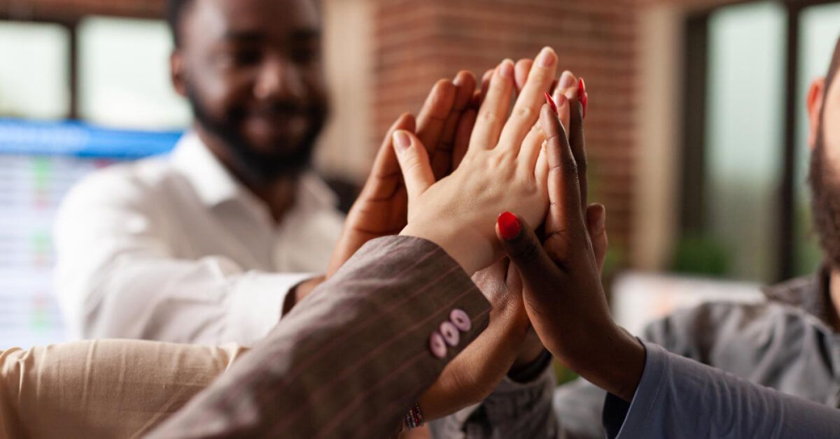 Employees giving high-fives