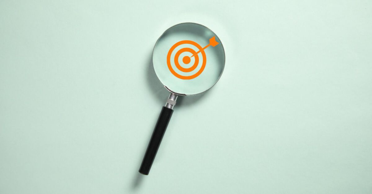 Magnifier glass over a vector target graphic