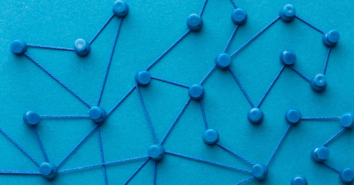 A network of blue pucks connected by a blue string