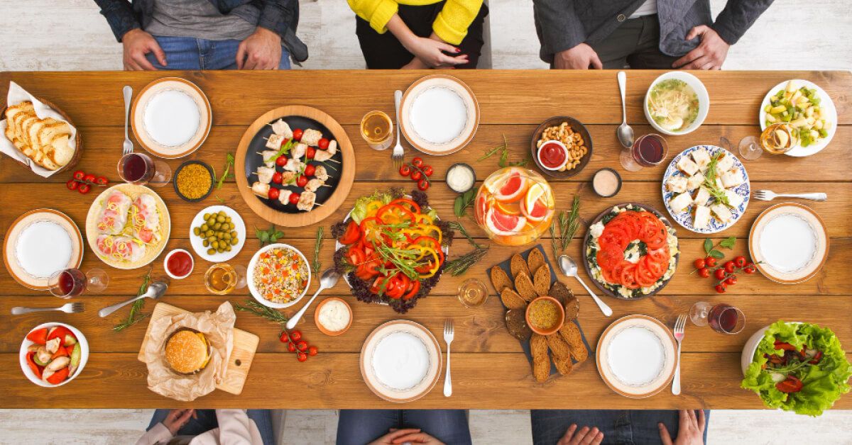 Employees are having a team lunch in their workplace