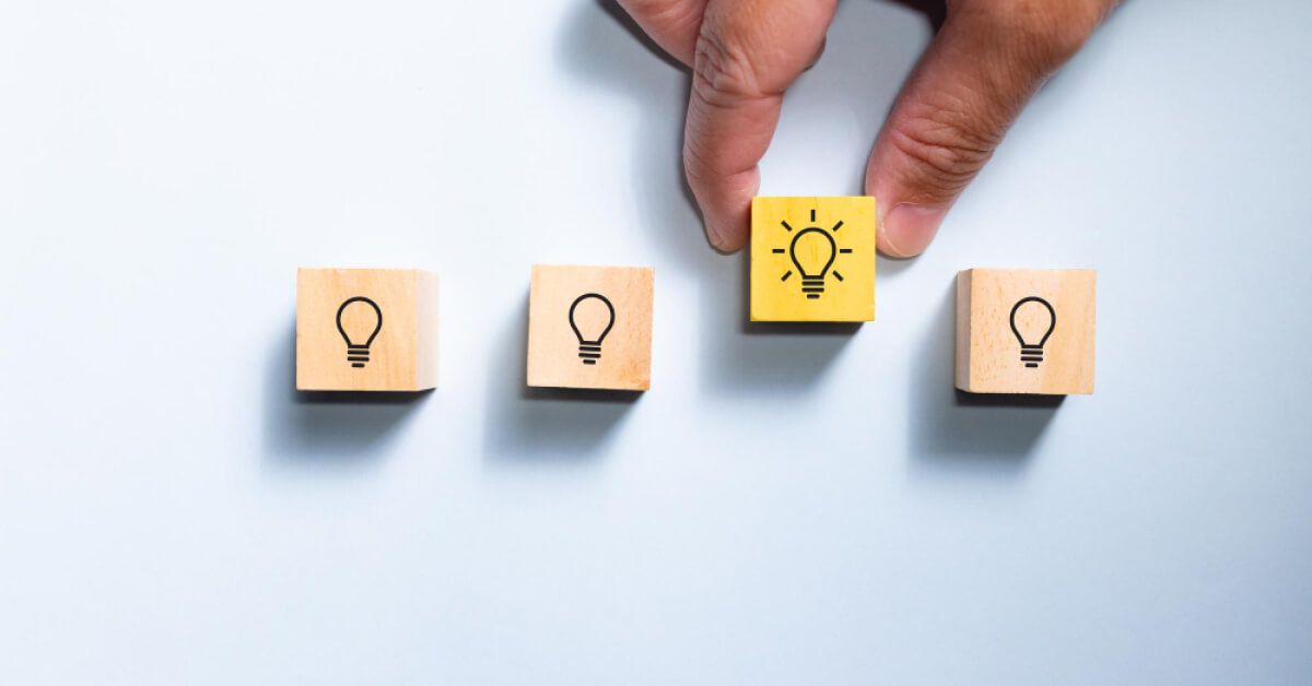 Wooden blocks with light bulb icons