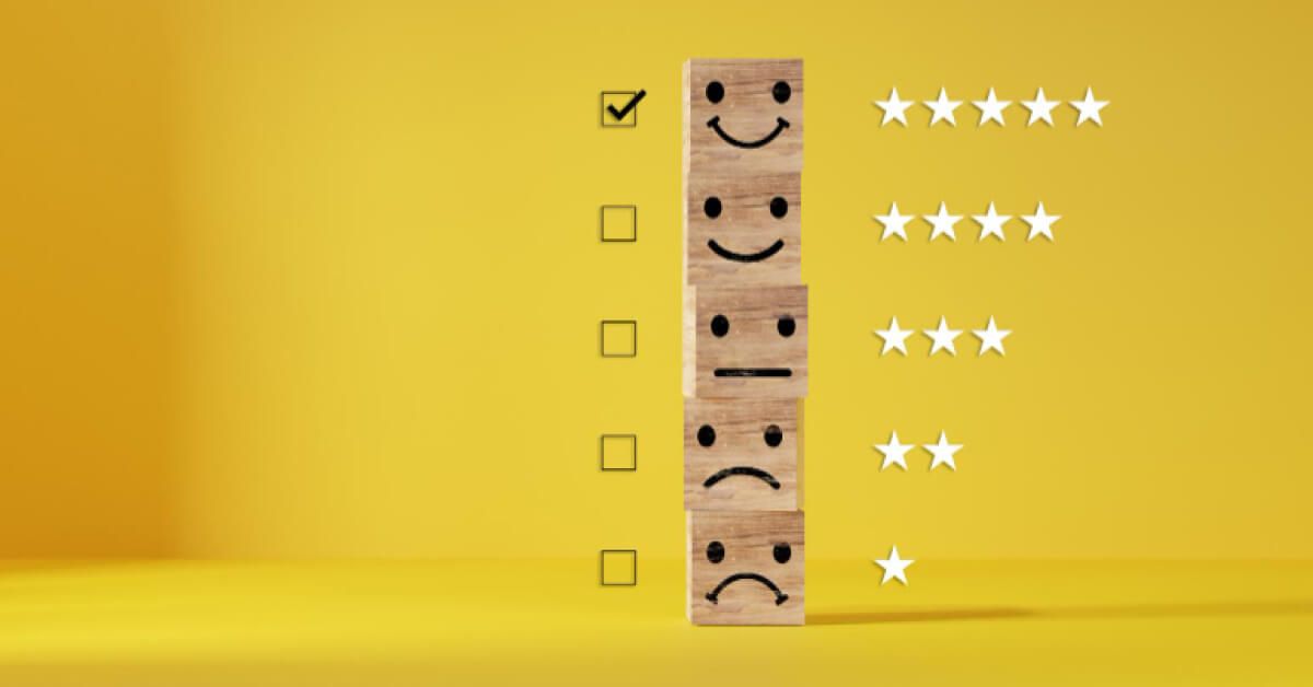 Sentiment rating scale with wooden blocks