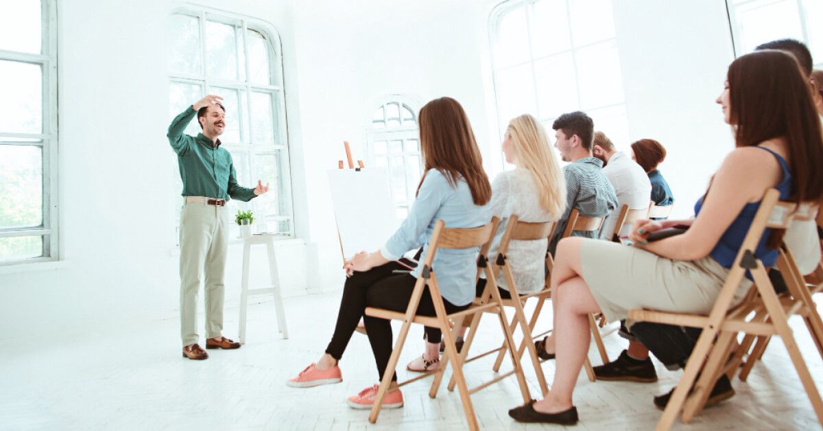 A group of people attending training