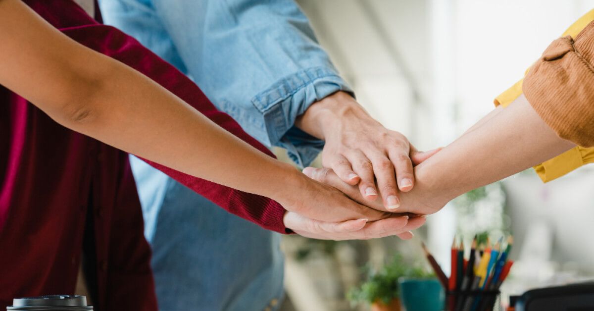 All hands are together in the workplace