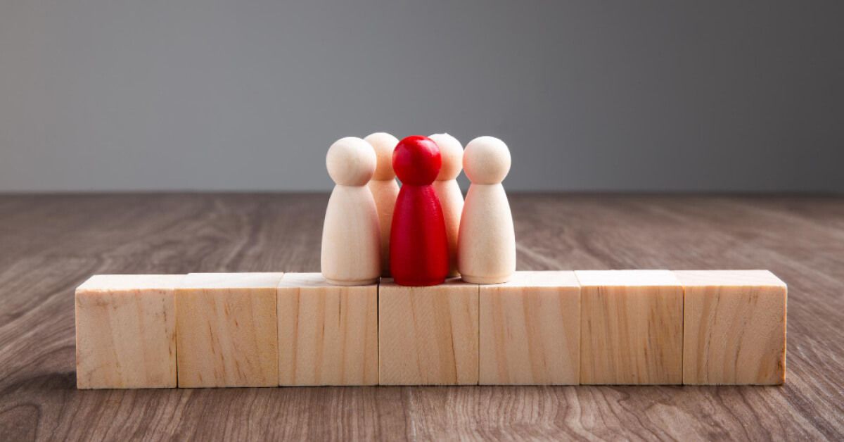 A bunch of wooden pawns