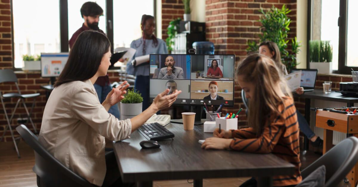 A video conference between remote and in office employees