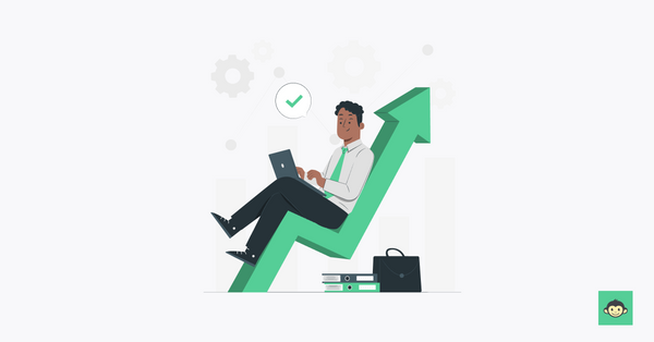 Employer sitting and working on an upward arrow.